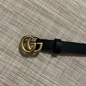 Black Gucci belt. Thin. 44 inches long.